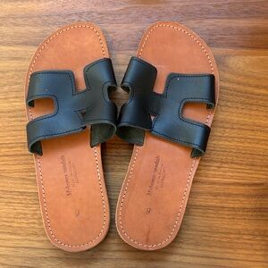 Black Leather Slide Sandals on Tan Footbed